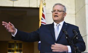 Australian Prime Minister Scott Morrison speaks to the media during a press conference at Parliament House in Canberra, Wednesday, March 18, 2020.