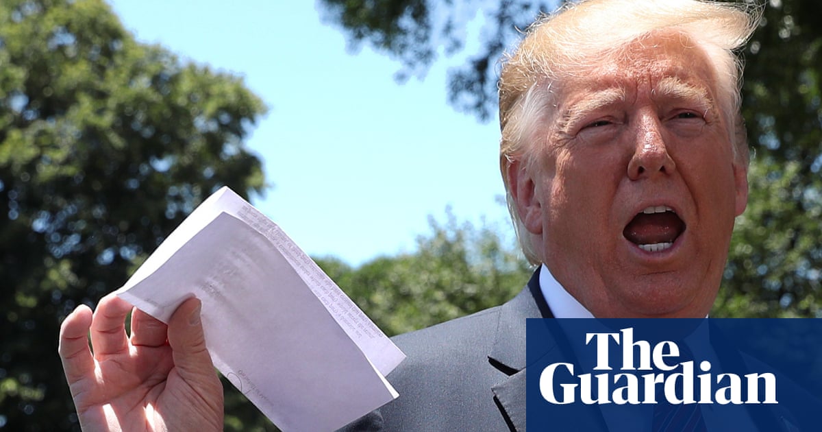 Donald Trump shows off 'secret' Mexico document but photos reveal contents - The Guardian