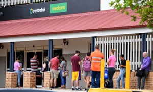 A queue of people outside a centrelink office