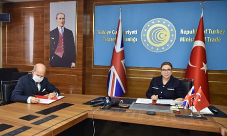 The Turkish trade minister, Ruhsar Pekcan, right, and the UK’s ambassador to Turkey, Dominick Chilcott, attend the signing ceremony for a free trade agreement