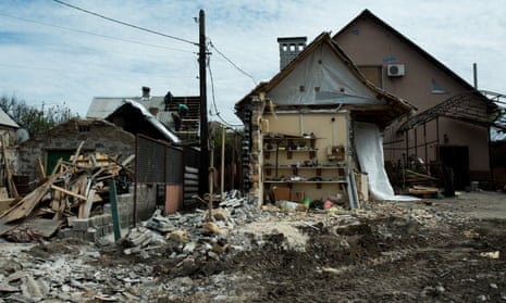 Homes in Zaporizhzhia damaged after a nighttime missile attack on Friday