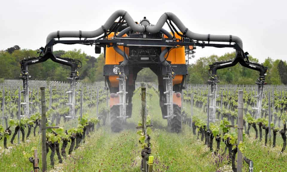 A vineyard fumigation tractor in the Bordeaux wine-growing region, France