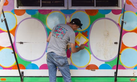 Ali Salman Anchan begins painting the truck in Sindh, Pakistan