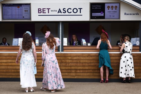 Some racegoers are actually having a bet.