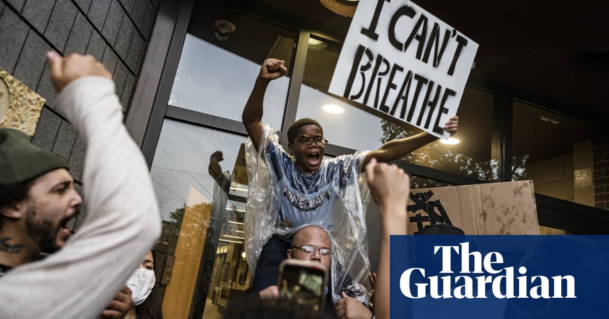Protests in Minneapolis over death of George Floyd after arrest – in