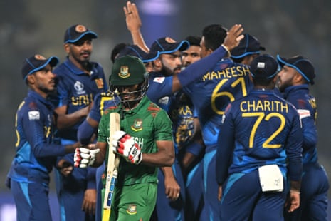 Tanzid Hasan leaves the field as Sri Lanka celebrate. 