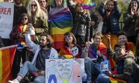 People in Bucharest protest against proposed changes to the constitution that they say would prevent future recognition of same-sex marriages in Romania.