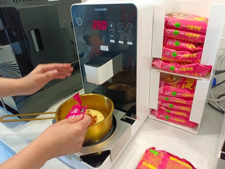 A person making instant noodles