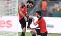 Trézéguet (right) thanks Mohamed Salah