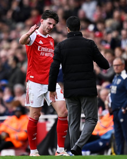 Arsenal’s Declan Rice with Mikel Arteta after being substituted