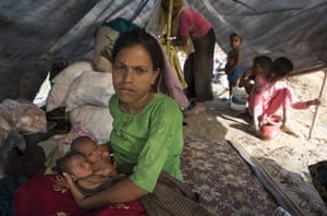 Rokeya Begum, 23, holds her 4 day old twins born in a makeshift tent in Kutupalong, Cox’s Bazar, Bangladesh.