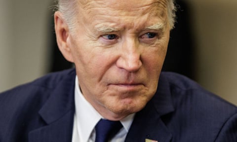 close-up of man wearing navy suit and tie
