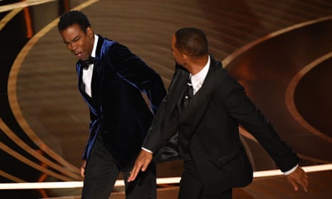 Will Smith slapping Chris Rock onstage during the 94th Oscars in March.