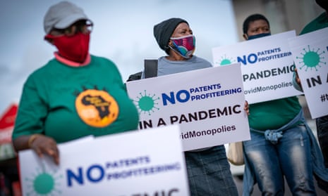 Members of the People's Vaccine Campaign of South Africa protest against patents profiteering in Cape Town, South Africa, 11 March 2021. 