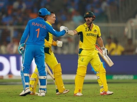 Travis Head bumps fists with KL Rahul scoring a match-winning 137.