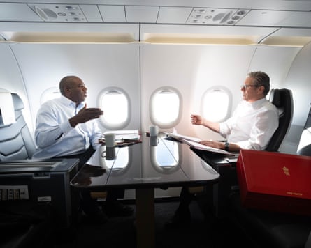 The UK foreign secretary, David Lammy, and Starmer, on their way to Washington in September 2024.