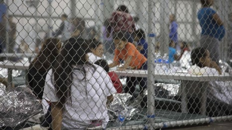 Separated migrant families held in cages at Texas border – video 
