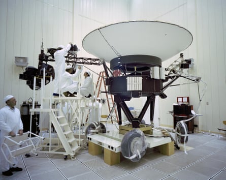 Nasa engineers working on the Voyager 2 spacecraft before its launch in 1977. V