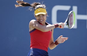 Emma Raducanu fires a forehand to Shuai Zhang.