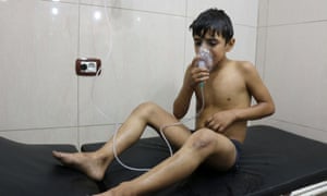 A Syrian boy suffering from breathing difficulties is treated at a makeshift hospital in Aleppo.