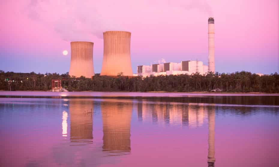 Water vapour and unseen oxides of carbon rise from a coal-fired power station in Queensland, Australia.
