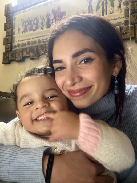 Two-year-old Julia Abu Hussein, the granddaughter of Ghada Ageel’s sister, with Ghada’s daughter, Ghaida. Julia was killed by shrapnel in the family home after a bomb blast.