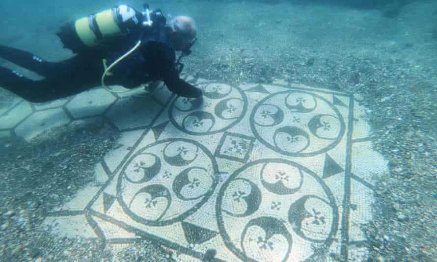 A dive usher  with a mosaic from a villa successful  submerged Baiae.