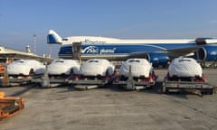 A supplied image obtained Thursday, October 11, 2018 of Maserati vehicles on the tarmac. Papua New Guinea is struggling with a polio outbreak but it has found millions of dollars to buy 40 Maseratis to ferry world leaders at an upcoming meeting. (AAP Image/Supplied by AirBridgeCargo) NO ARCHIVING, EDITORIAL USE ONLY