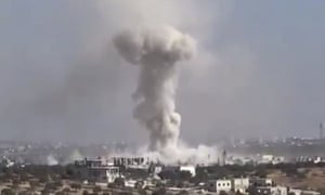 Video frame grab showing smoke after an airstrike on  Haas, Syria.