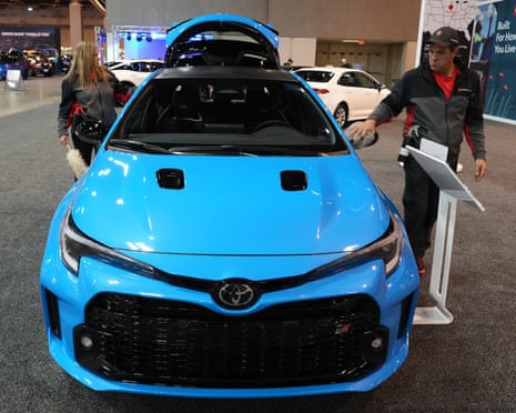 Crews dust a Toyota GR Corolla at the St Louis auto show at the Cervantes Convention Center, St Louis, Missouri, US, in January 2024