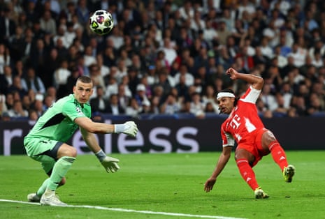 Bayern Munich's Serge Gnabry shot glances of Real Madrid's keeper Andriy Lunin and wide of the upright.