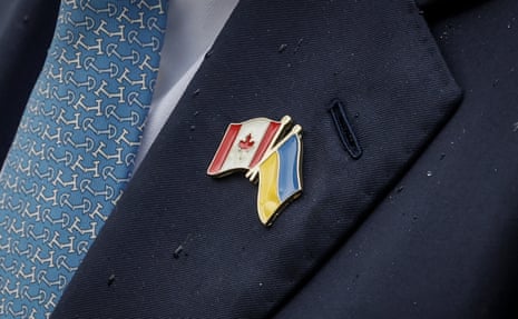 Ukraine Minister of Finance, Sergii Marchenko, wears a Canadian and Ukrainian flag pin while speaking to the media prior to the G7 Finance Ministers meeting in Banff, Alberta.