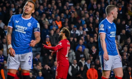 Liverpool’s Mohamed Salah celebrates scoring in their 7-1 hammering of Rangers at Ibrox.