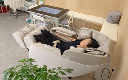 A woman in a massage chair