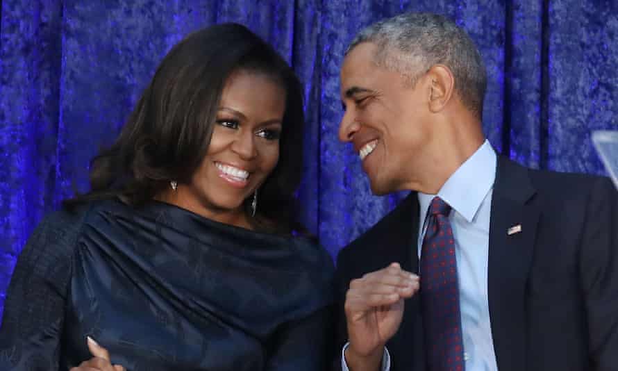 Michelle and Barack Obama at the unveiling of their official portraits at the National Portrait Gallery in February.