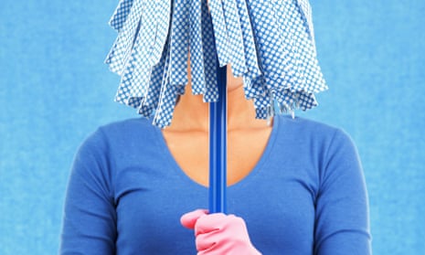 Woman holding mop in front of her face