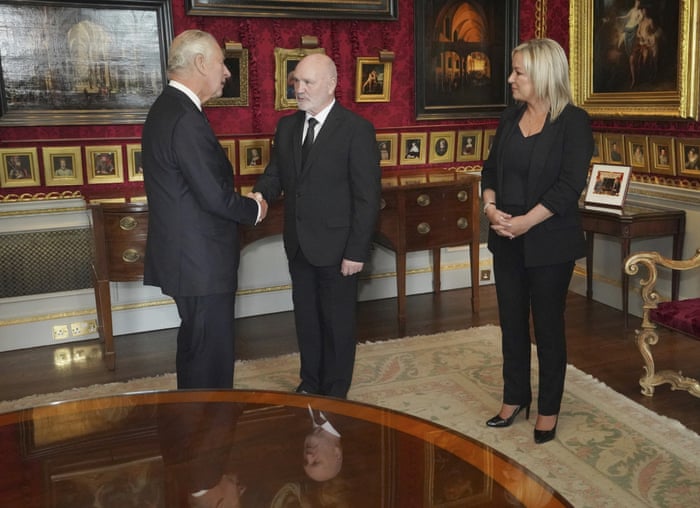 King Charles III meets Northern Ireland Assembly Speaker Alex Maskey, center, and Sinn Féin vice president Michelle O’Neill.