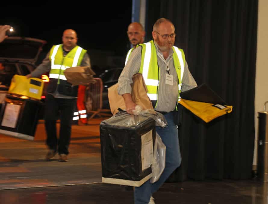 Ballot boxes arrive for the count in Peterbourgh.