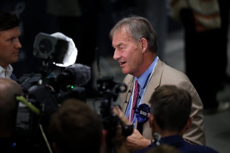 Rupert Lowe MP, the Restore Britain leader, speaking to reporters at the Makerfield count.