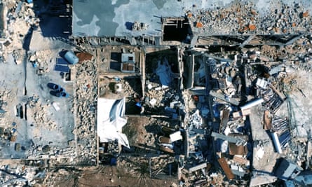 A damaged building is seen in the aftermath of the earthquake, in Aleppo, Syria.