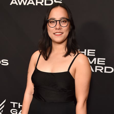 Emma Kidwell standing in front of a black backdrop with the words ‘The Game Awards’ in 2022.