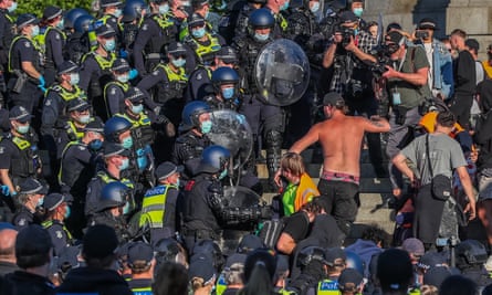 Protestors clash with riot police at the Shrine of Remembrance amid a two-week shutdown of Victoria’s construction industry.