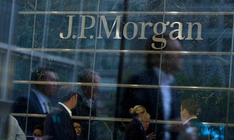 People walk past JP Morgan's office