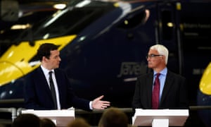 George Osborne and Alistair Darling standing at podiums at an event together