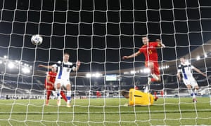 Kieffer Moore of Wales opens the scoring from close range.