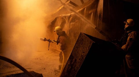 Firefighters put out a fire