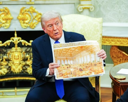 Donald Trump holds an interior rendering of the new White House ballroom