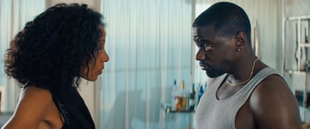 Rosalind Eleazar and Daniel Kaluuya stand close, facing each other intensely in a scene from Misty Green.