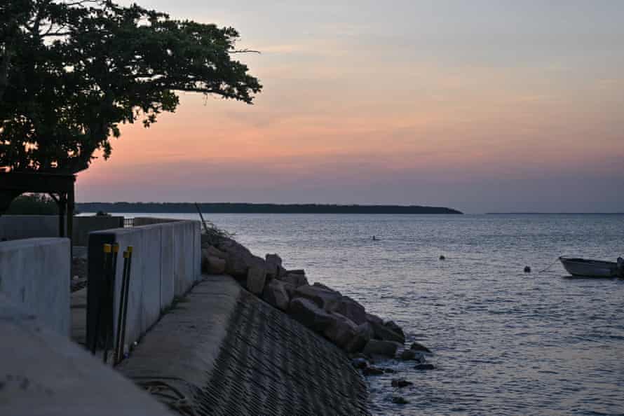 Sunset beyond the seawall at Boigu