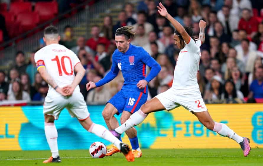 England's Jack Grealish (centre) battles for the ball with Switzerland's Granit Xhaka (left) and Kevin Mbabu.
